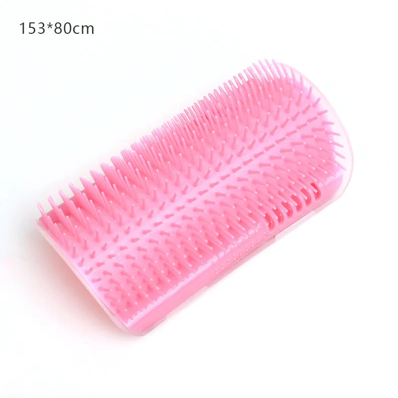 Pink grooming brush on a white background